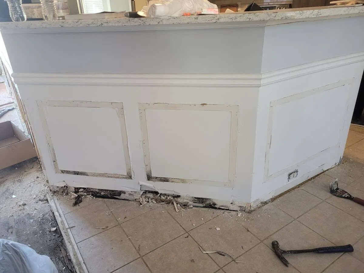 Water damage and mold on kitchen during Storm Damage Restoration in Country Club